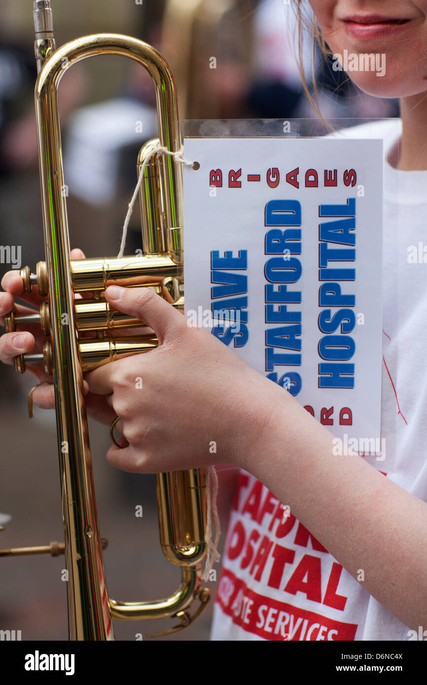 Protesters march through Stafford against cuts to NHS services at Stafford Hospital Stock Photo