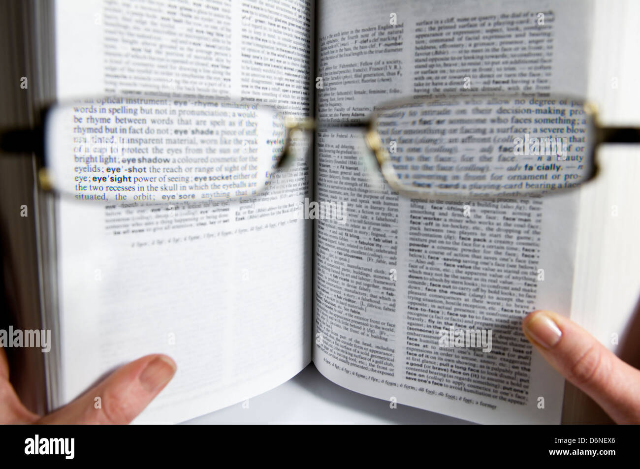 View through prescription glasses focusing on the word eyesight Stock Photo