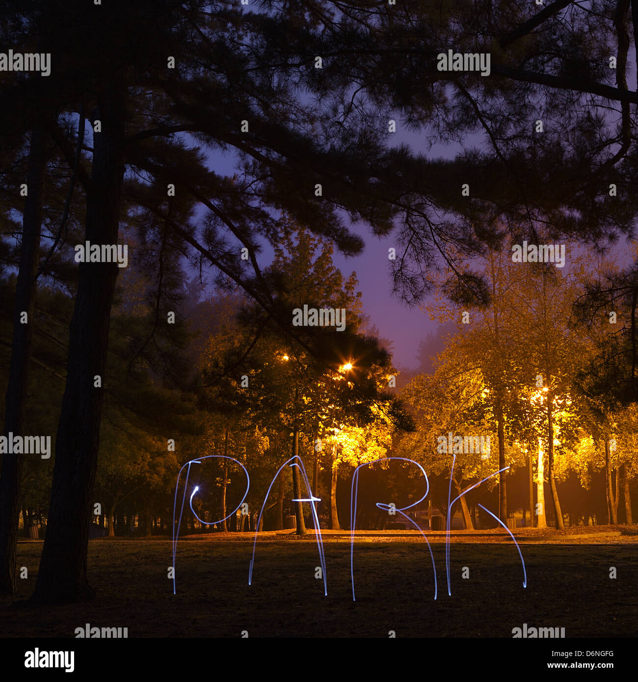 Early morning park. Word park written by light Stock Photo Alamy