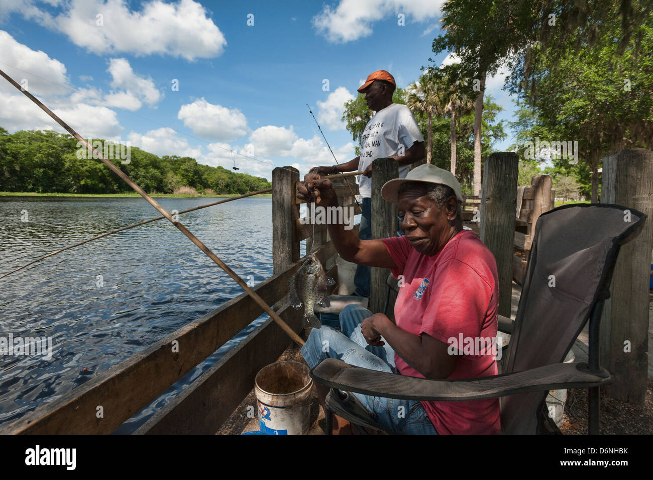 Black woman fishing for Mullet on the St.Johns River in Central Florida USA  Stock Photo - Alamy