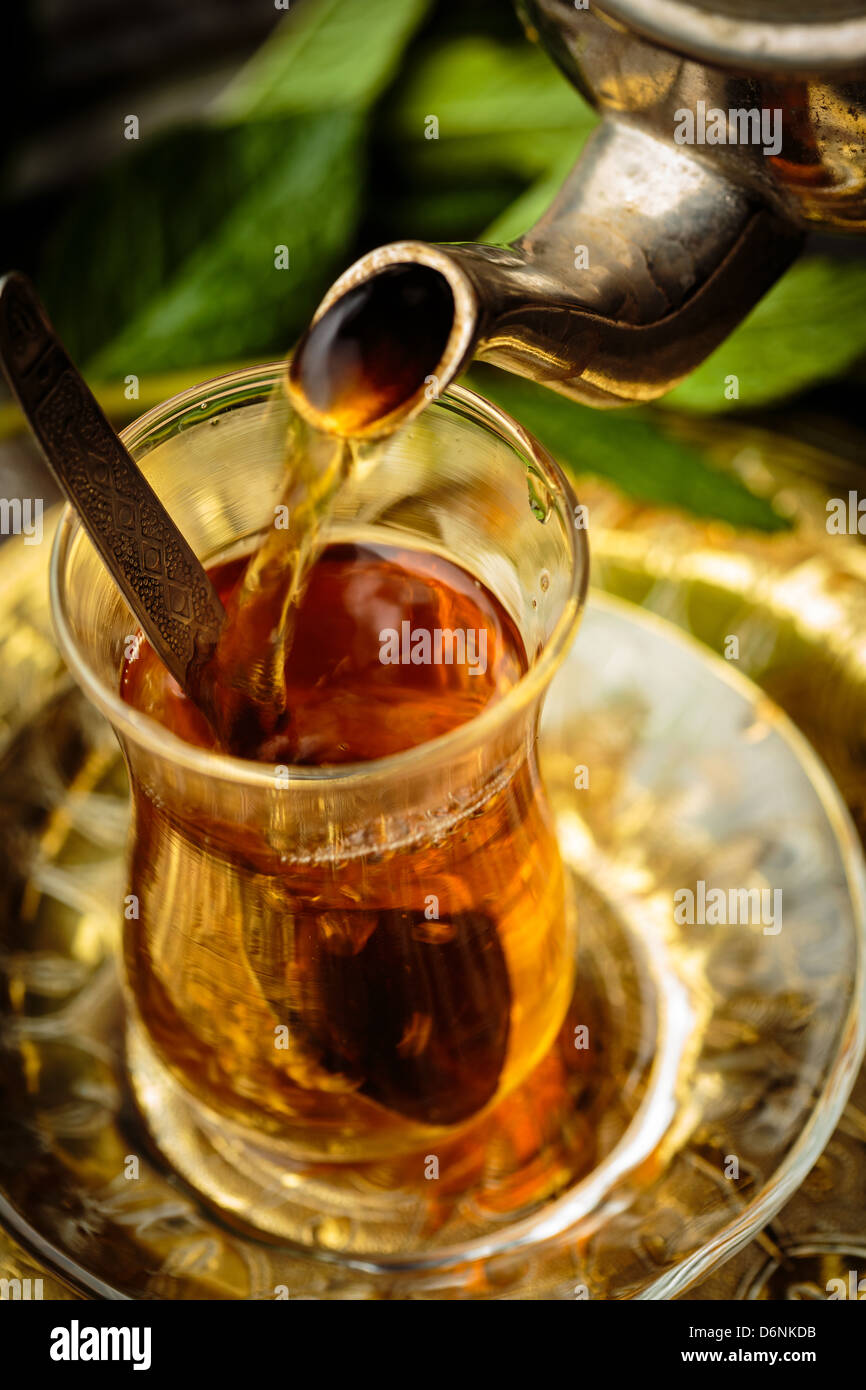 Pouring tea into glass hires stock photography and images Alamy