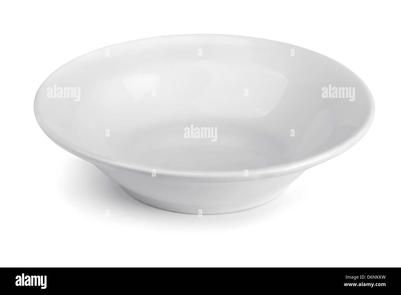 Empty porcelain soup plate isolated on white Stock Photo