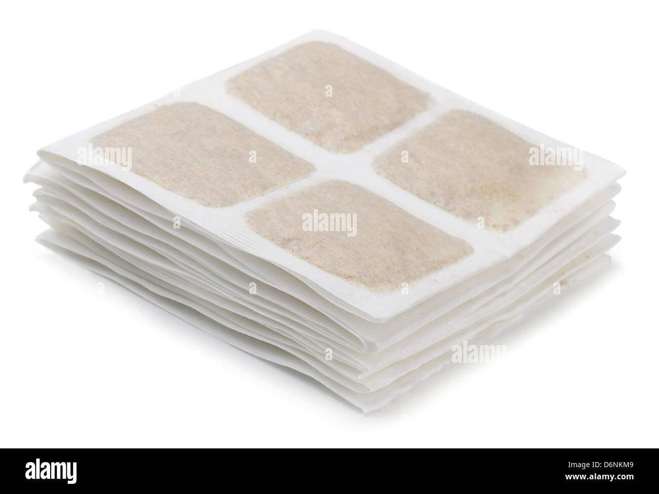 Stack of warm mustard plasters isolated on white Stock Photo