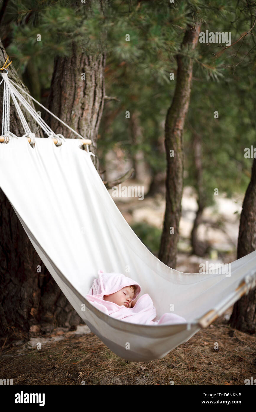 baby sleeping in hammock Stock Photo Alamy