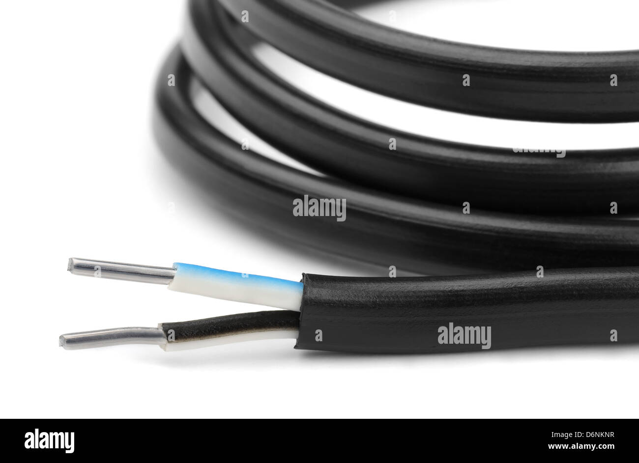 Close-up of rolled electric 2 core mains cable isolated on white Stock Photo