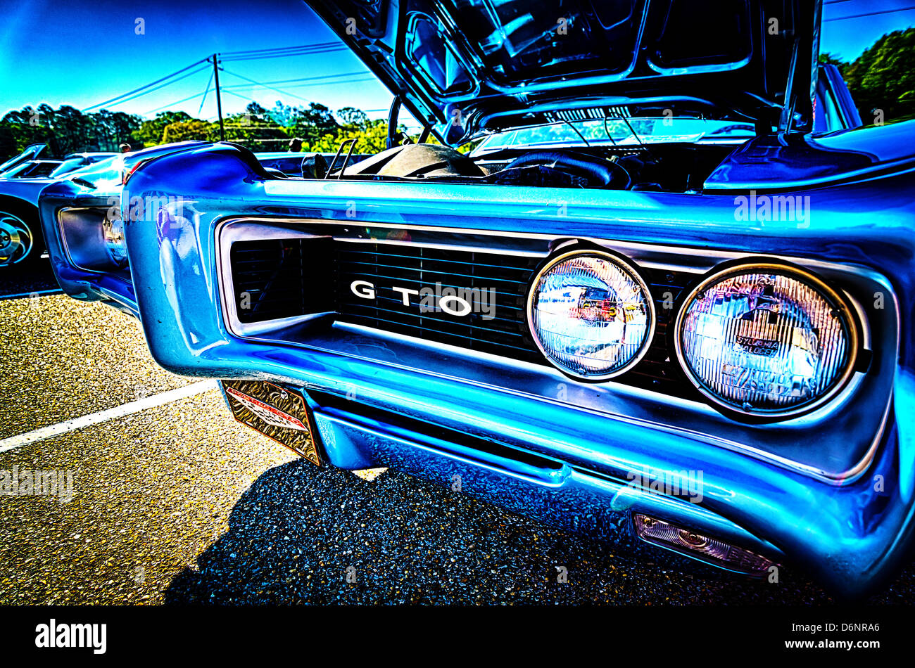 Closeup of front of vintage blue Pontiac GTO muscle car. Stock Photo