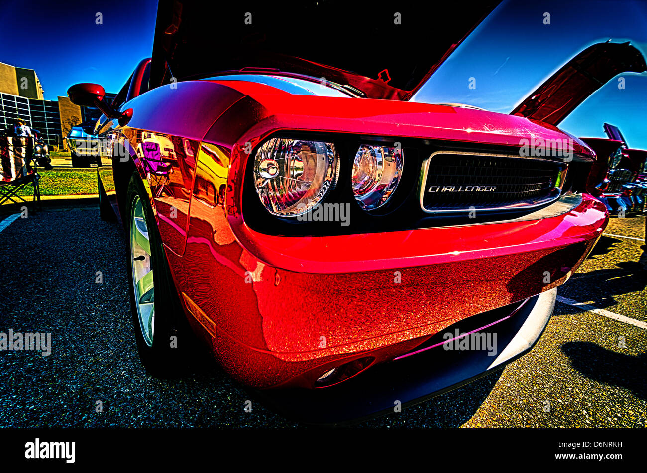 Closeup of red Dodge Challenger muscle car at car show. Stock Photo