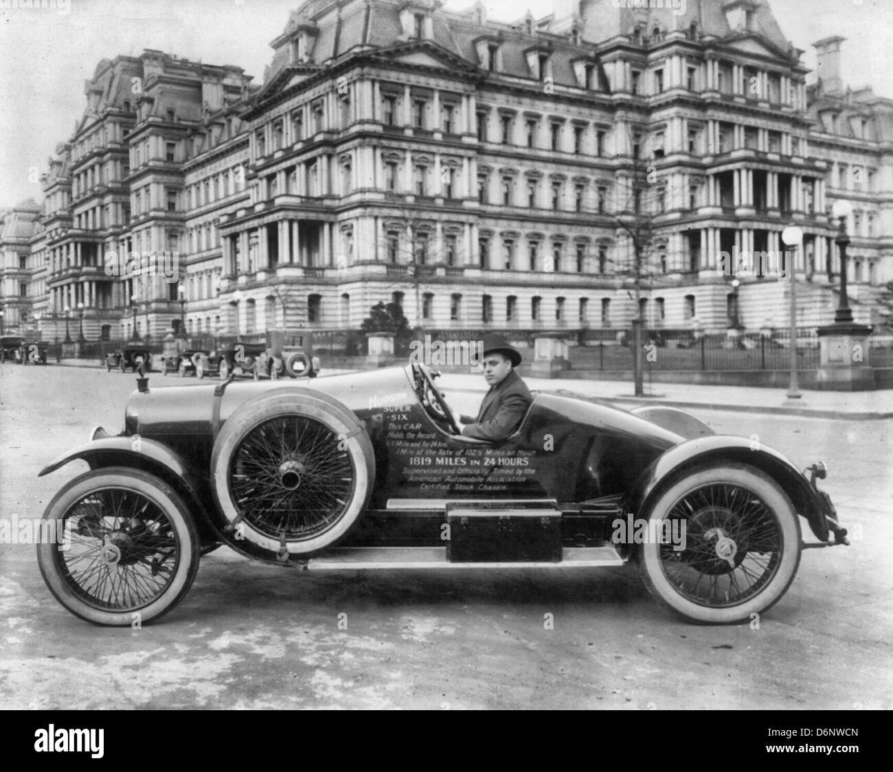 Hudson super six automobile in Washington, D.C., at 17th and Pennsylvania Avenues, N.W., in front of State, War, and Navy Building, circa 1920 Stock Photo