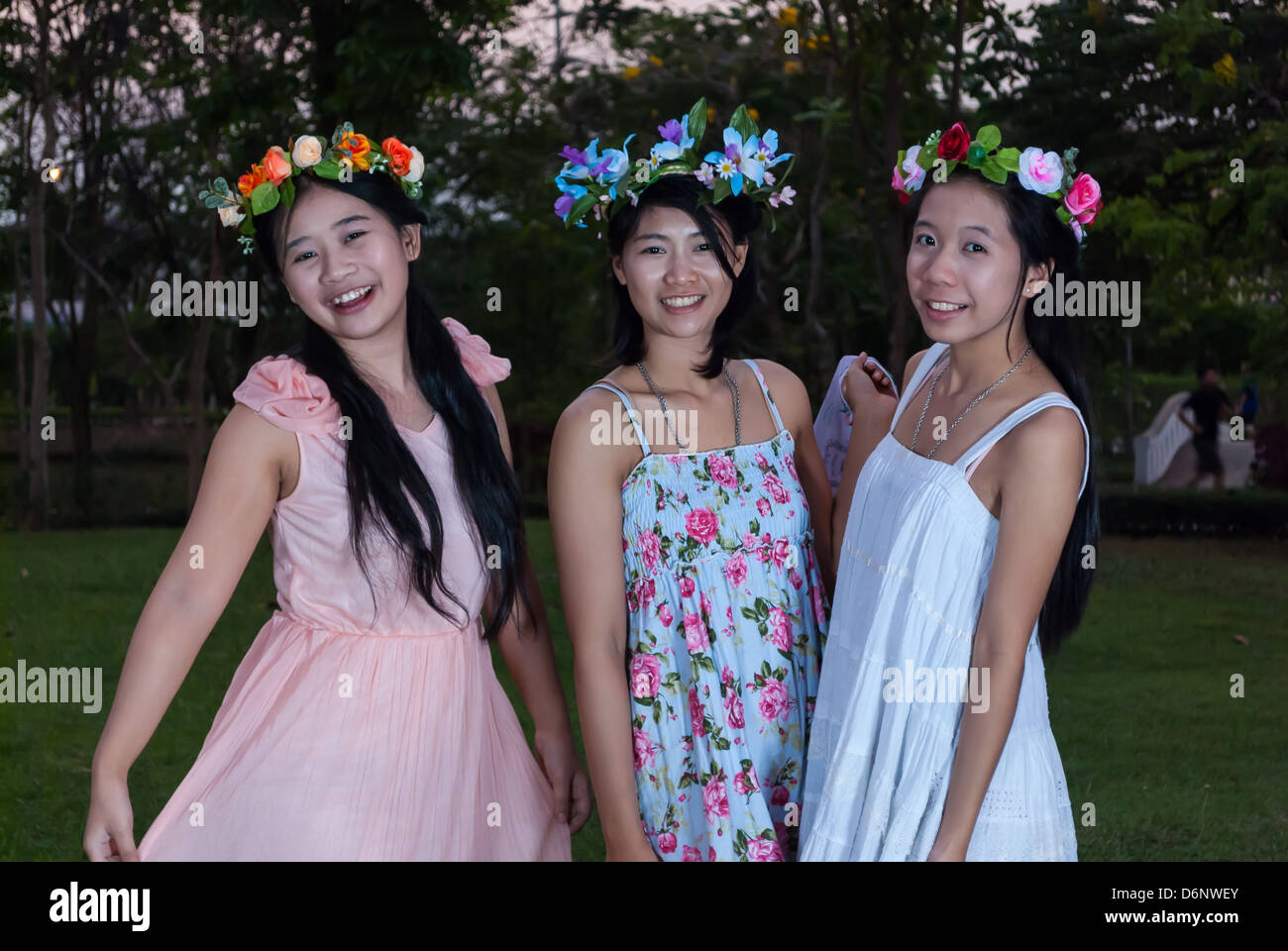 Asian Thai Girls with Flower Crown in the Park Stock Photo