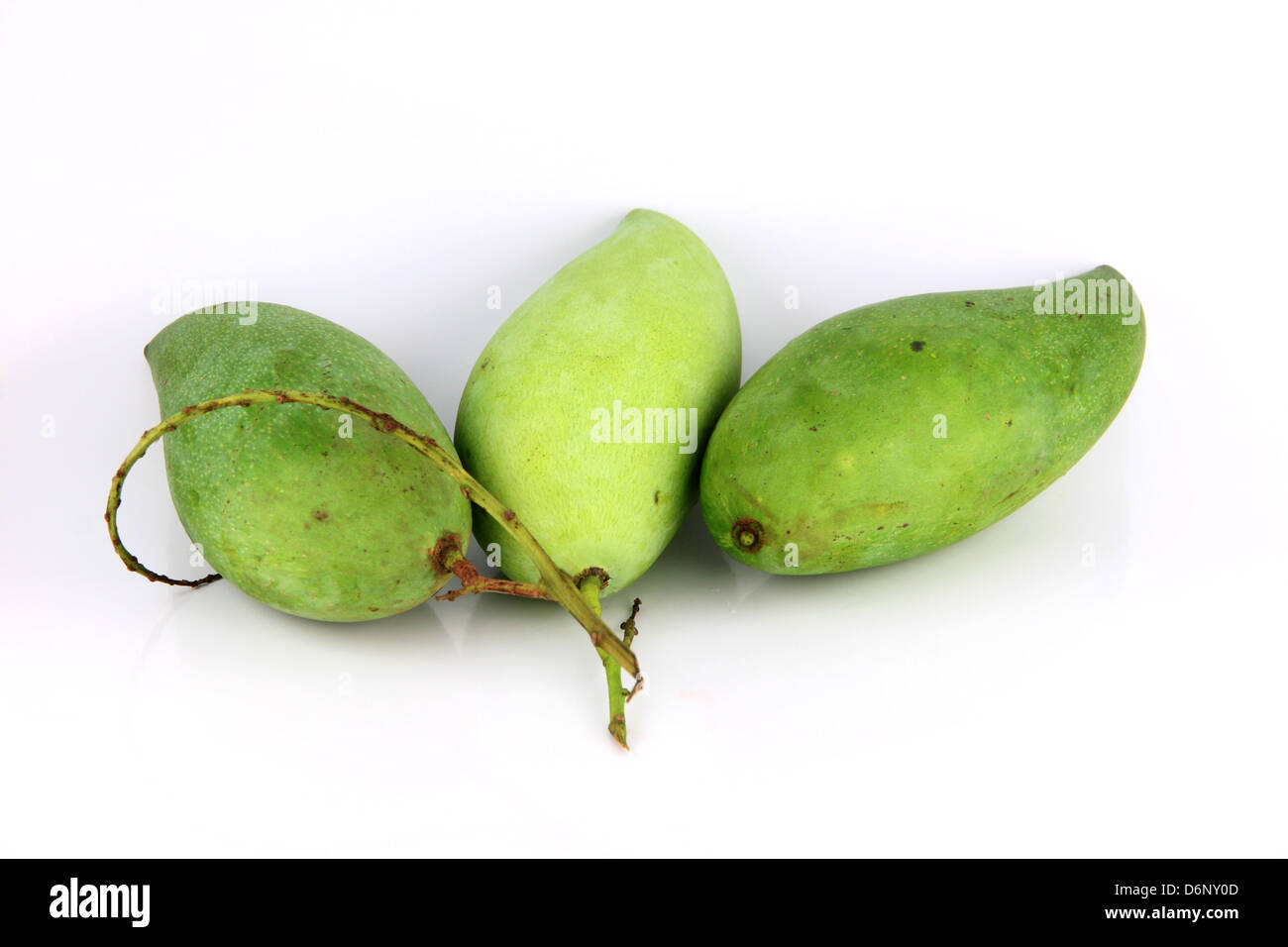 The Ripe mangoes are in the yellow color,on white Background. Stock Photo