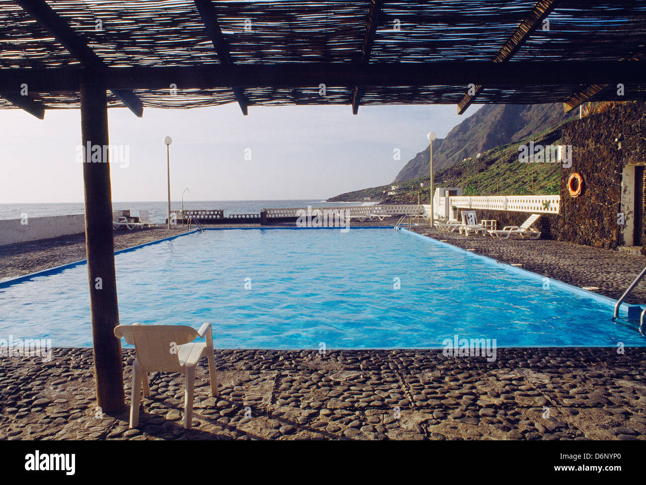 Swimming pool nearby the sea. Parador de turismo, El Hierro island, Canary Islands, Spain. Stock Photo