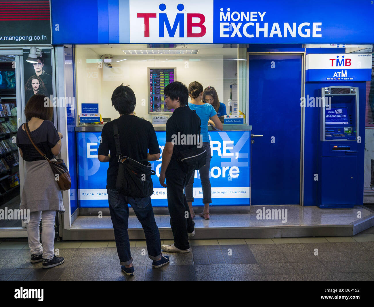 April 21, 2013 Bangkok, Thailand People line up to buy Thai Baht at