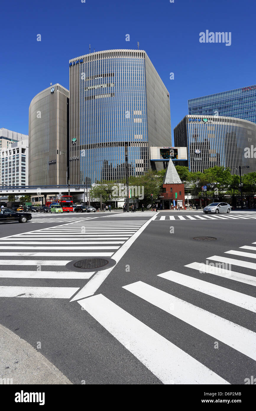Japanese street scene of modern buildings and a pedestrian crossing in Ginza, Tokyo, Japan Stock Photo
