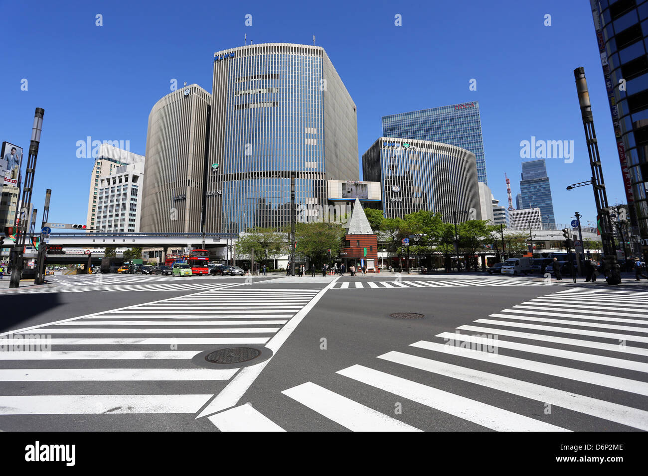 Japanese street scene of modern buildings and a pedestrian crossing in Ginza, Tokyo, Japan Stock Photo