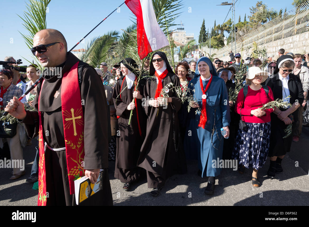 JERUSALEM, ISRAEL - March 24: Catholic Palm Sunday procession from Mount of Olives on March 24, 2013 in Jerusalem, Israel. Stock Photo