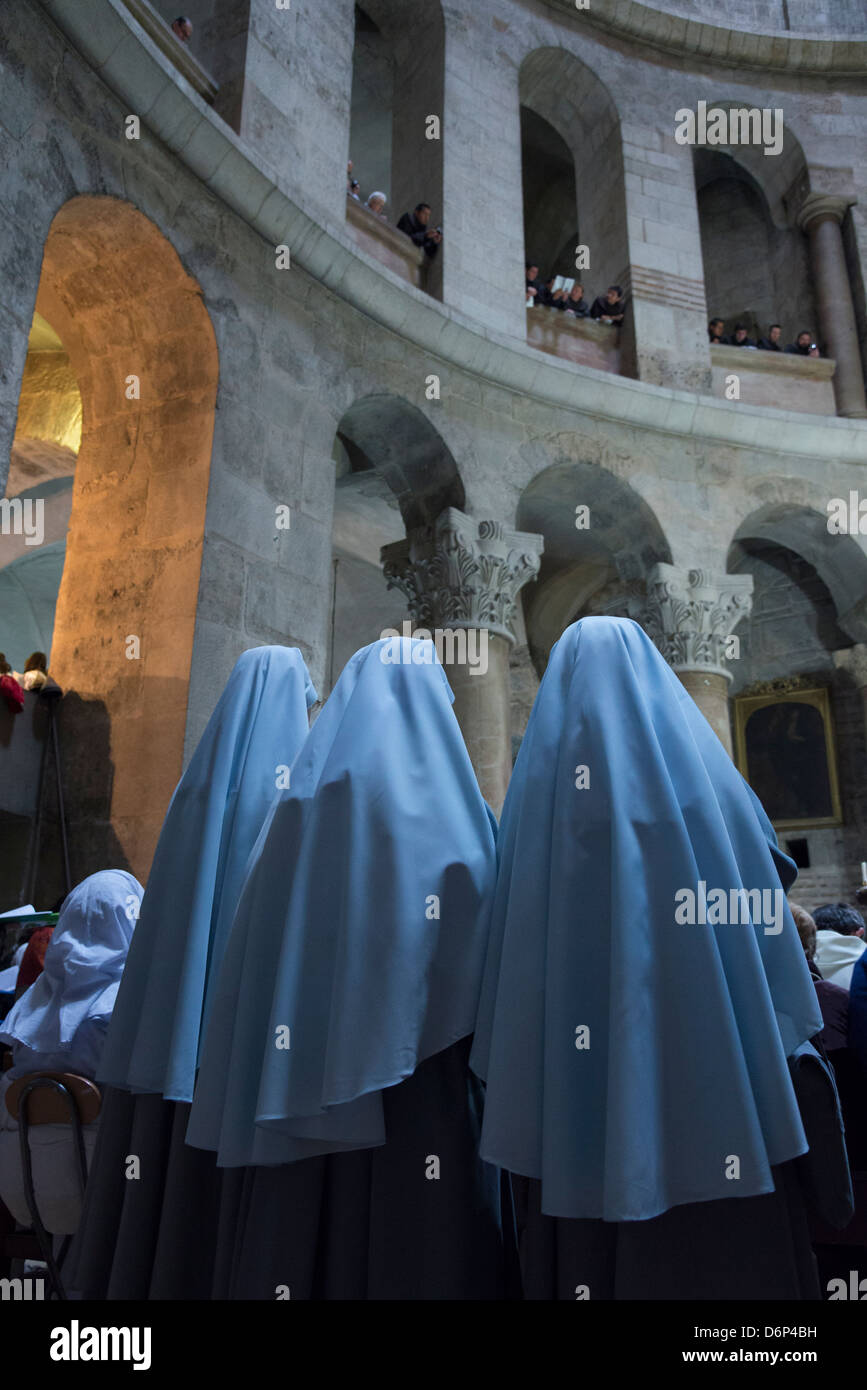 Pontifical catholic mass and procession of the Blessed Sacrement on Holy Thursday. Holy Sepulcher. Jerusalem Old City. Israel. Stock Photo
