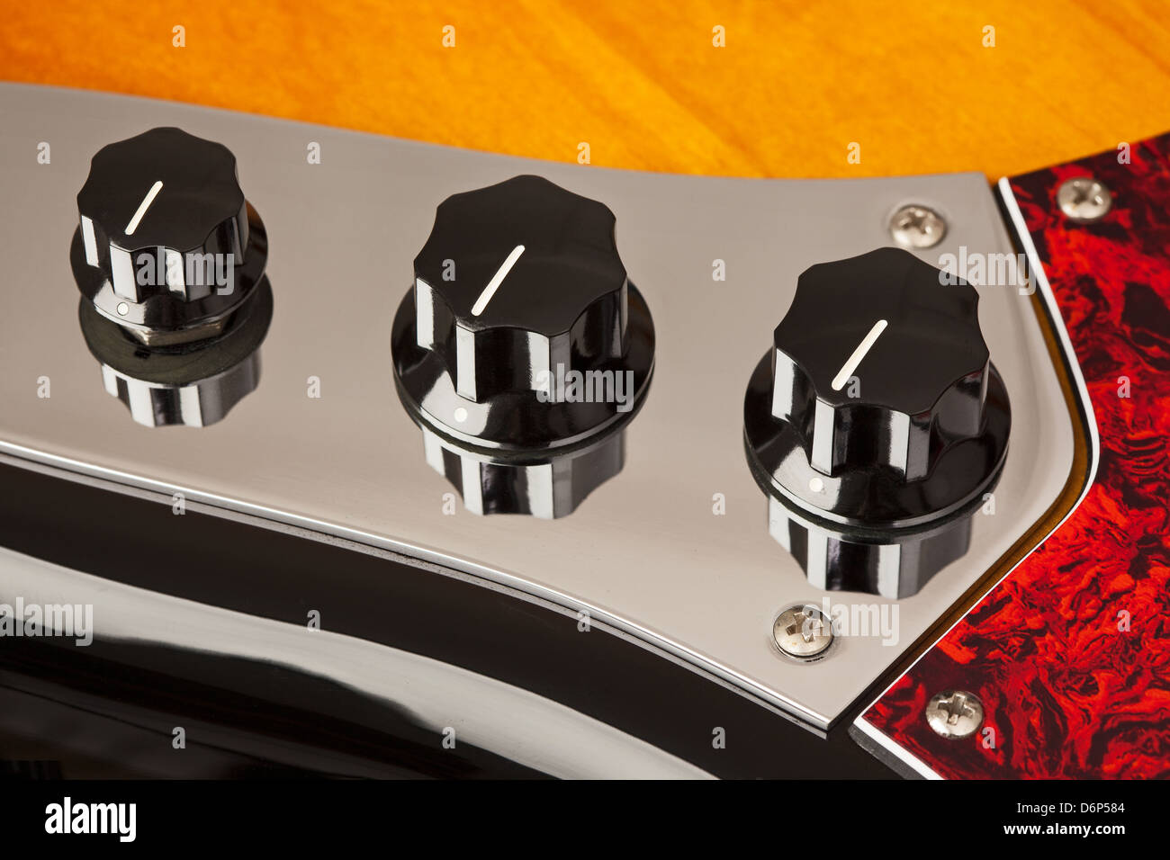 Close up of Three Rotary Controls on an Electric Guitar Stock Photo