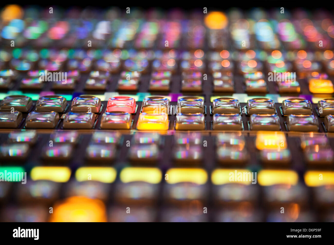 close up of rows of buttons on a vision mixing panel, with narrow depth