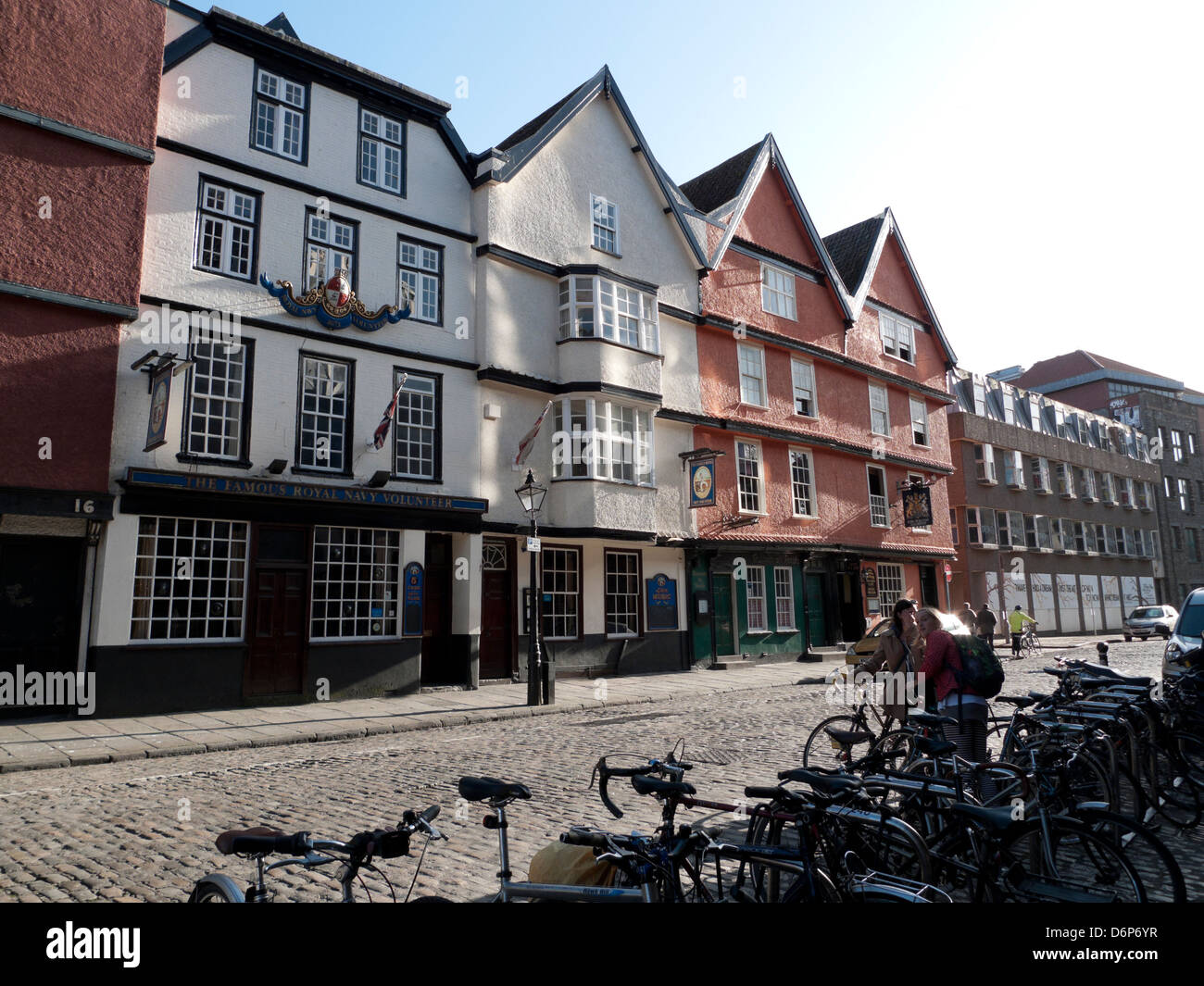A view of buildings and bicycles on cobblestone King Street in Bristol England UK  KATHY DEWITT Stock Photo