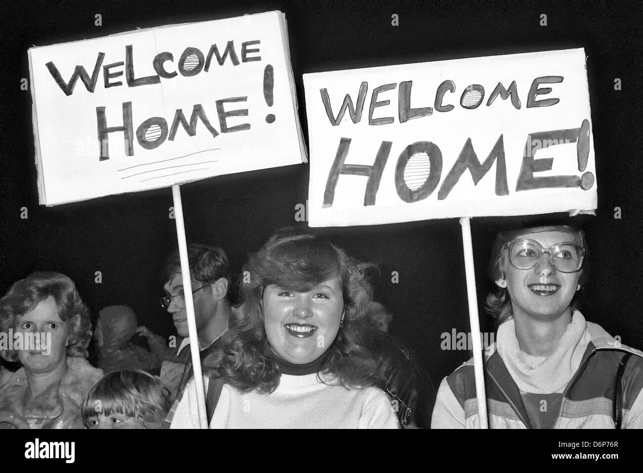 Well wishers welcome students from Saint George's University School of Medicine in Grenada as they arrive October 26, 1983 in Charleston, SC. The students were evacuated following the Invasion of Grenada, codenamed Operation Urgent Fury. Stock Photo