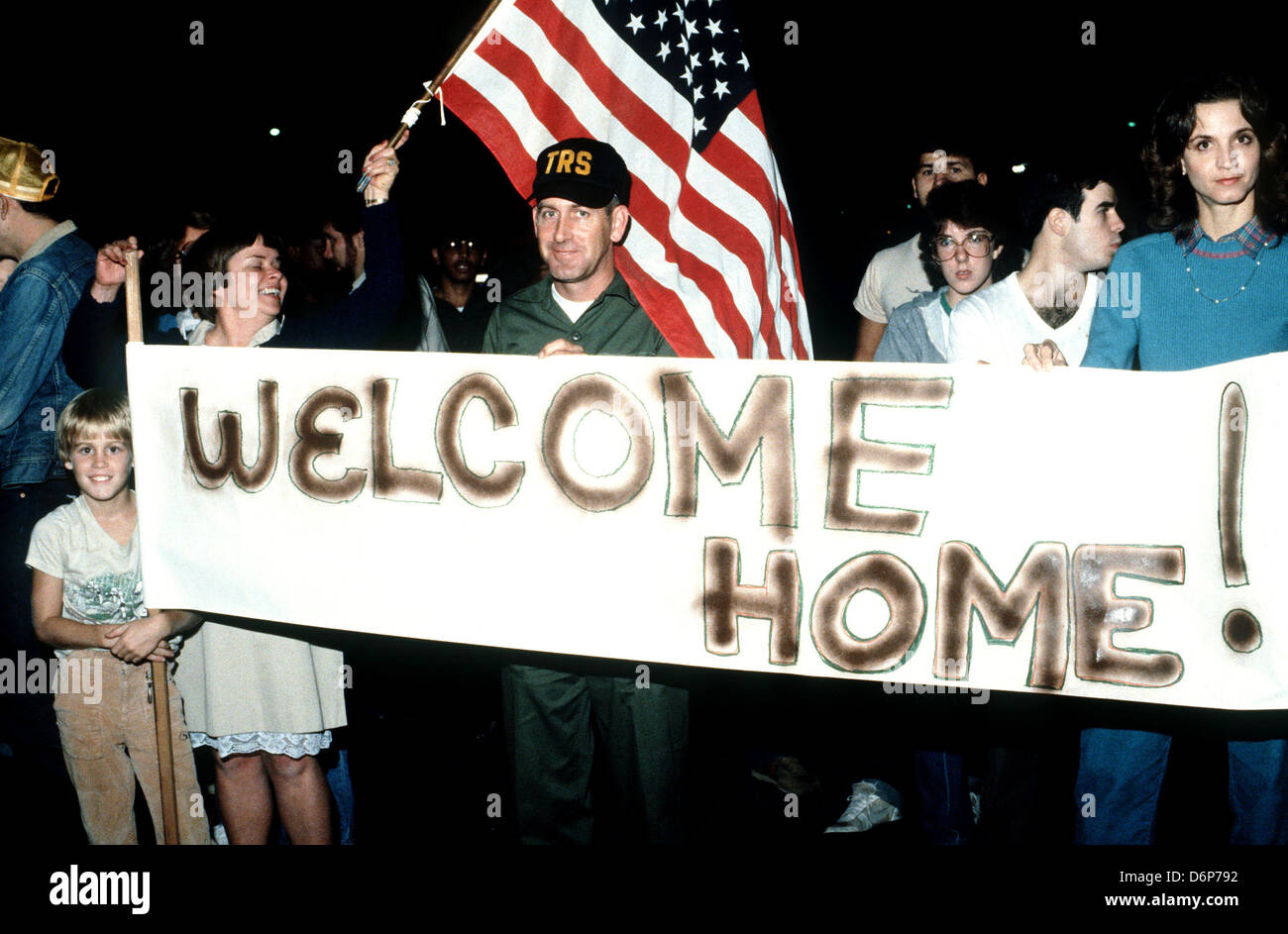 Well wishers welcome students from Saint George's University School of Medicine in Grenada as they arrive October 26, 1983 in Charleston, SC. The students were evacuated following the Invasion of Grenada, codenamed Operation Urgent Fury. Stock Photo
