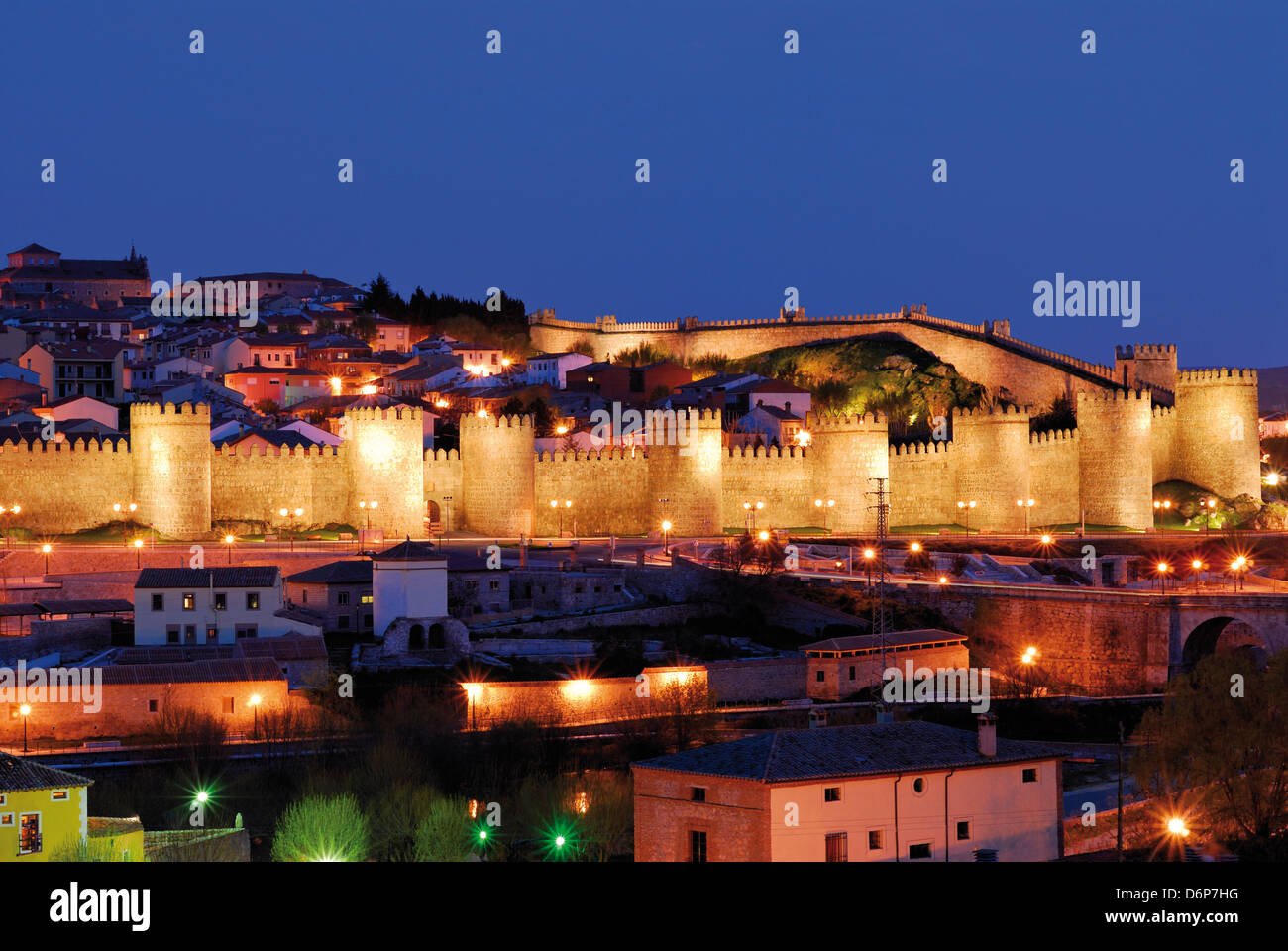 Spain: Nocturnal view to illuminated town walls of Unesco World Heritage town Ávila Stock Photo