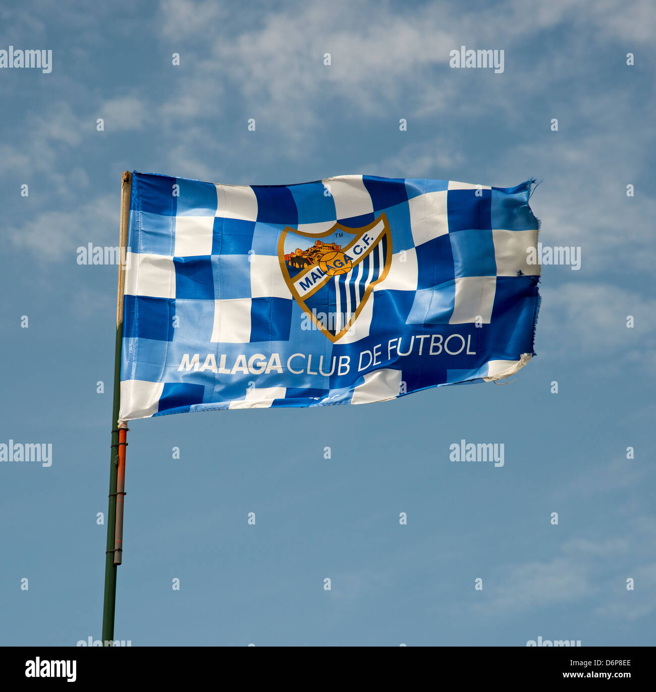 Malaga CF soccer club flag flying from a post Spanish football team Stock Photo
