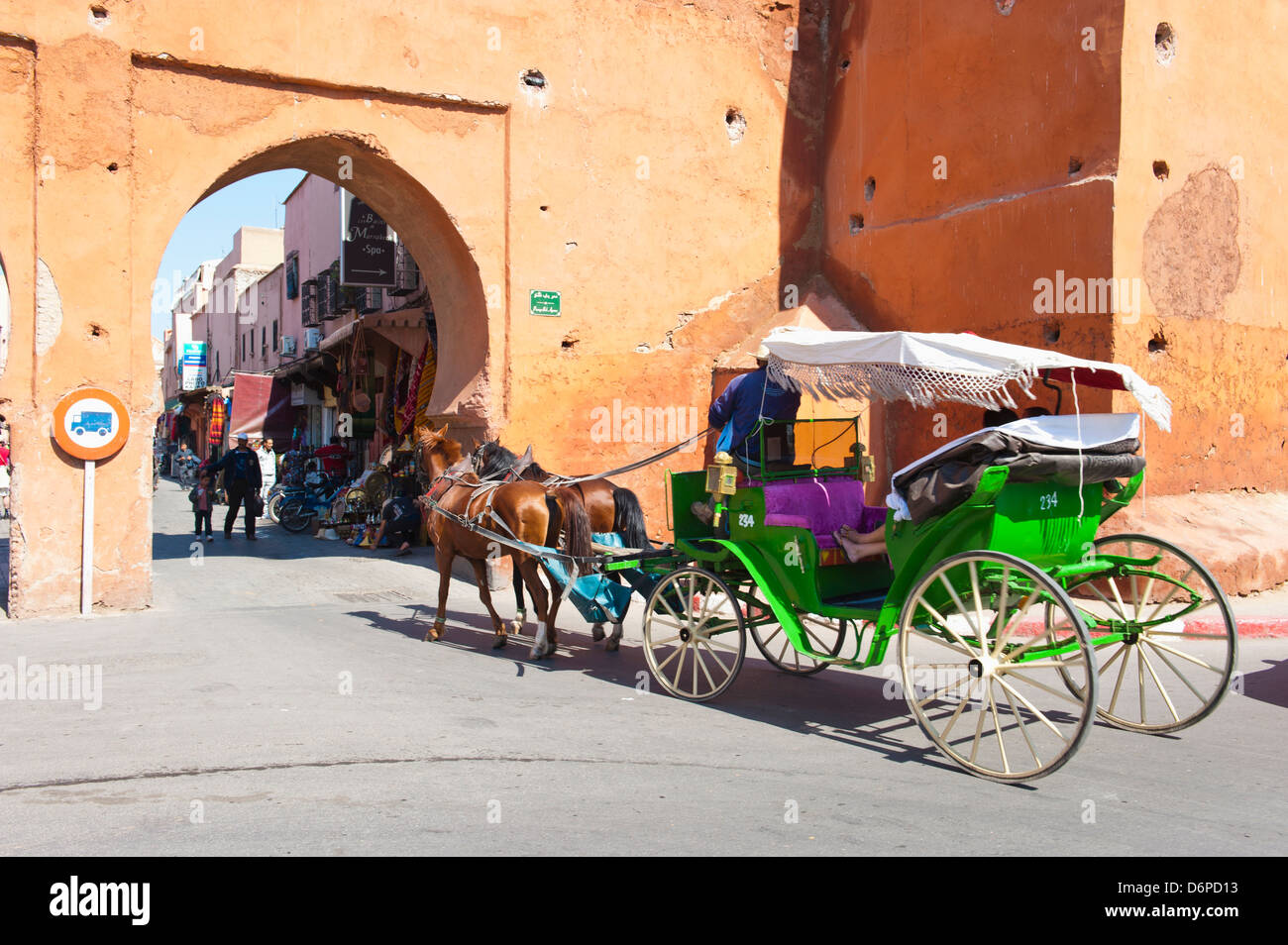 Tourists in Marrakech enjoying a horse and cart ride around the old medina, Marrakech, Morocco, North Africa, Africa Stock Photo