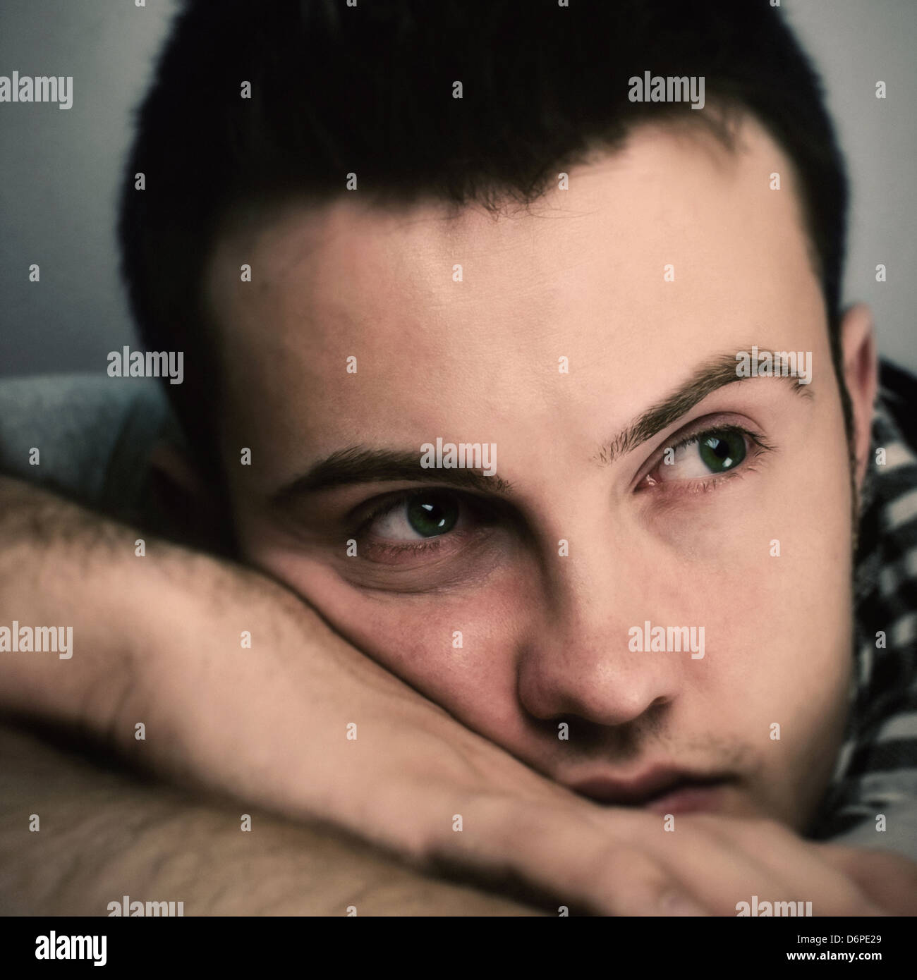 Young man who is lonely and desolate Stock Photo