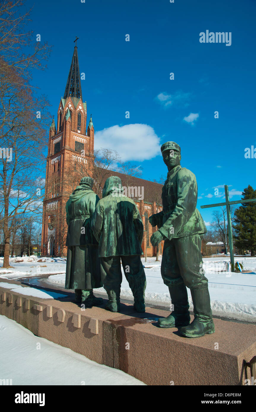 Second world war memorial in front of Neogothic style Keski-Porin Kirkko church (1863) Pori Finland Europe Stock Photo