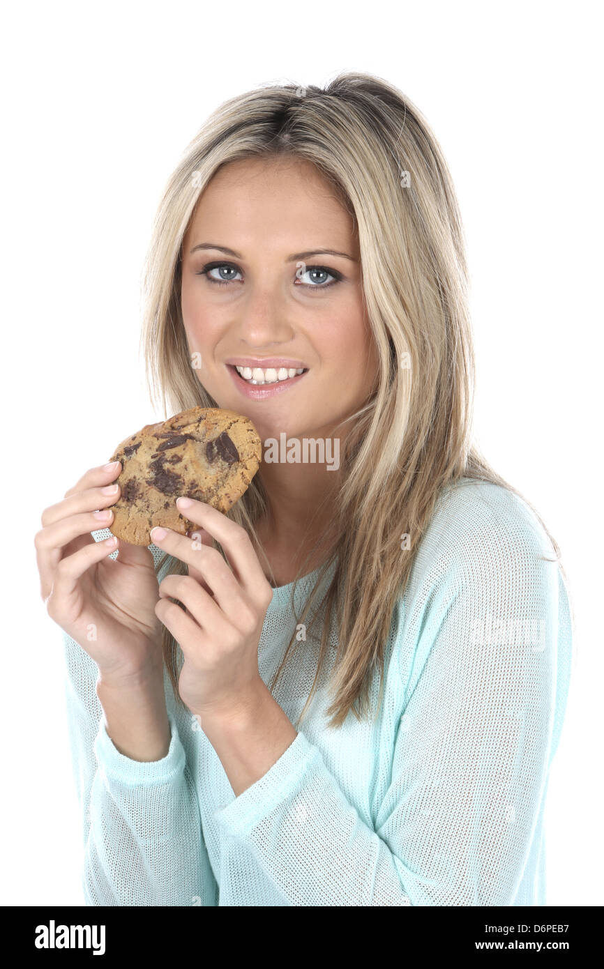 Woman Eating Freshly Baked Luxury Milk Chocolate Chip Cookies Food Isolated Against A White Background With A Clipping Path Stock Photo