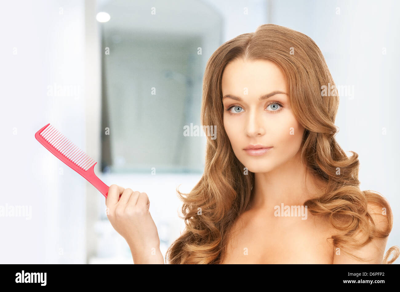beautiful woman with comb Stock Photo