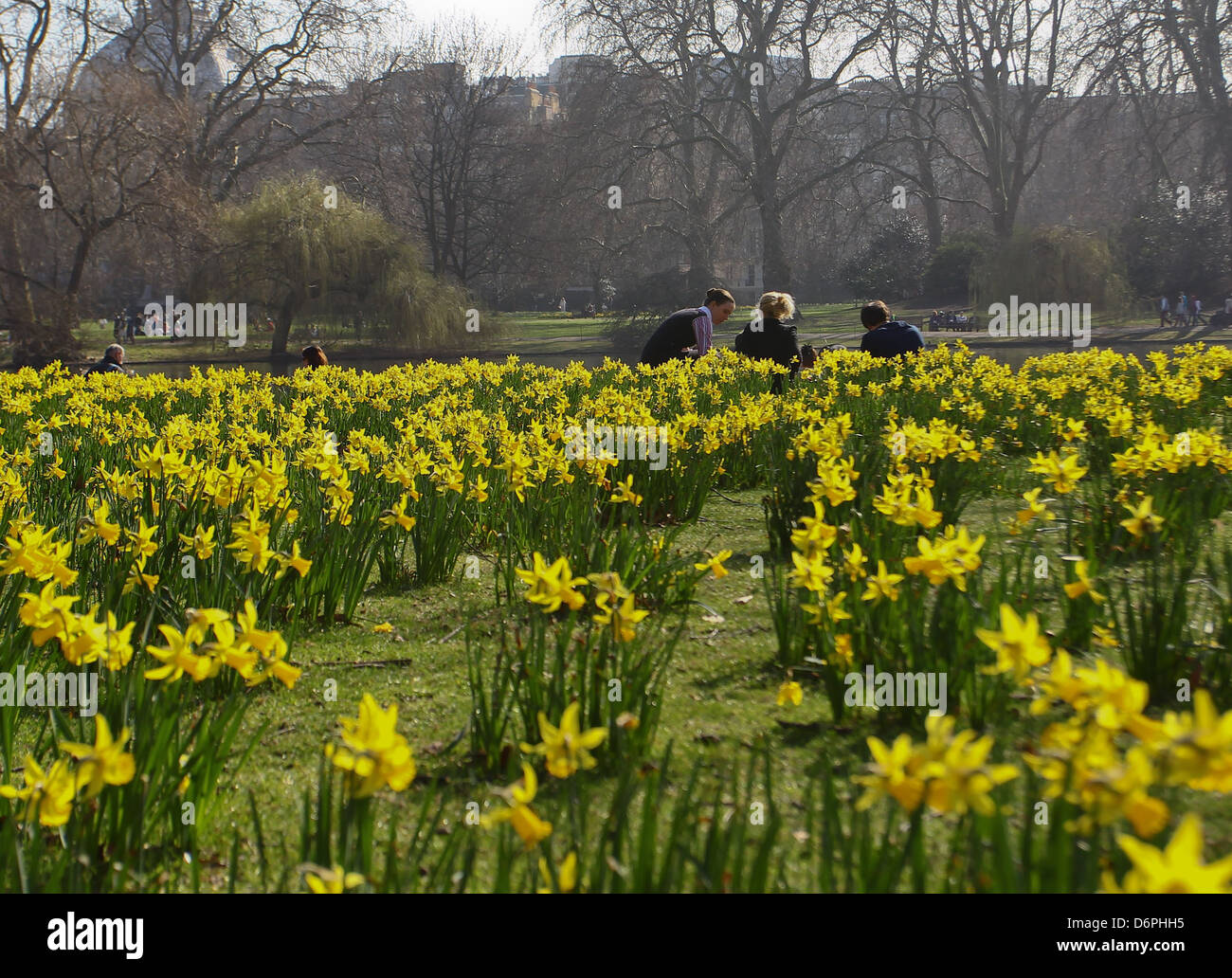 People enjoying the warm spring weather in St James's Park. Forecasters ...