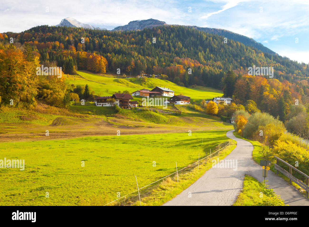 Bicycle path through rural mountain landscape in autumn, near Berchtesgaden, Bavaria, Germany, Europe Stock Photo