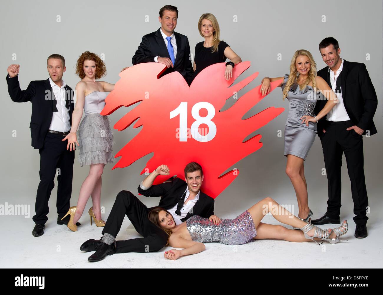 Actors  Dominic Saleh-Zaki (L-R, as Andi Fritzsche), Janina Isabell Batoly (as Bella Jacob), Wolfram Grandezka (above, as Ansgar von Lahnstein), Miriam Lahnstein (as Tanja von Lahnstein), Florian Wünsche (below, as Emilio Sanchez), Nicole Mieth (as Kim Wolf), Jana Julia Kilka (as Jessica Stiehl) and Jo Weil (as Oliver Sabel) from the German soap opera 'Verbotene Liebe' (lit: forbidden love) pose for photographer in Hamburg, Germany, 22 April 2013. The series is celebrating its 18th birthday in 2013. Photo: Sven Hoppe Stock Photo