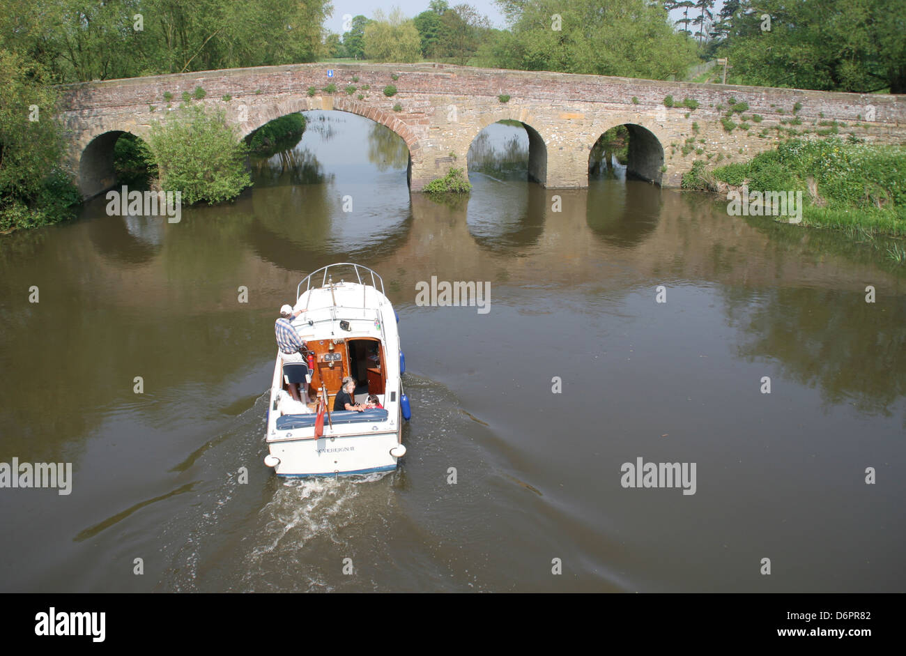 River Avon Inland Waterways cruising with 14c bridge Pershore Worcestershire England UK Stock Photo