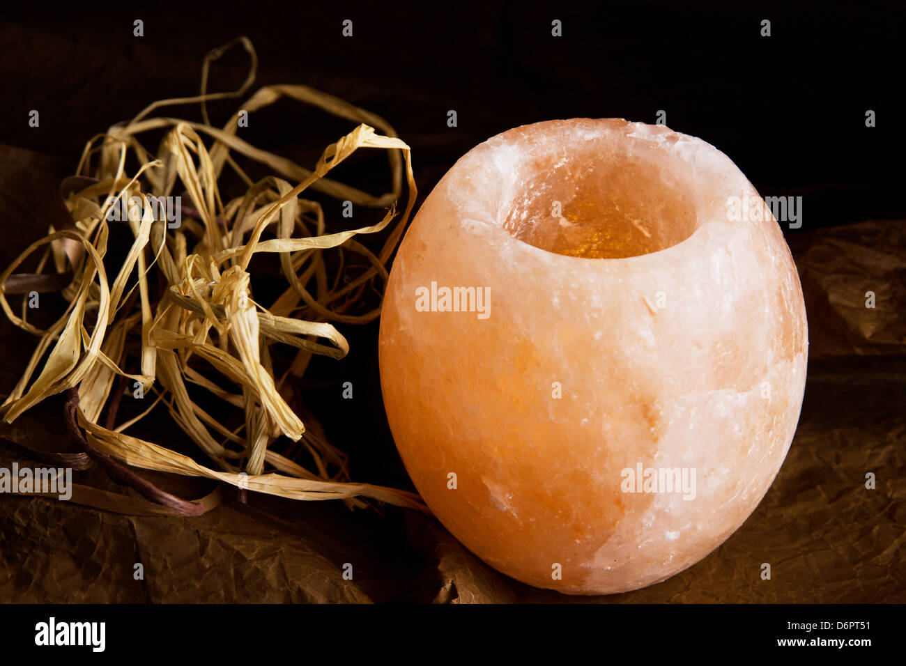 Spa candle. Saltcrystal ionizing candlestick Stock Photo Alamy