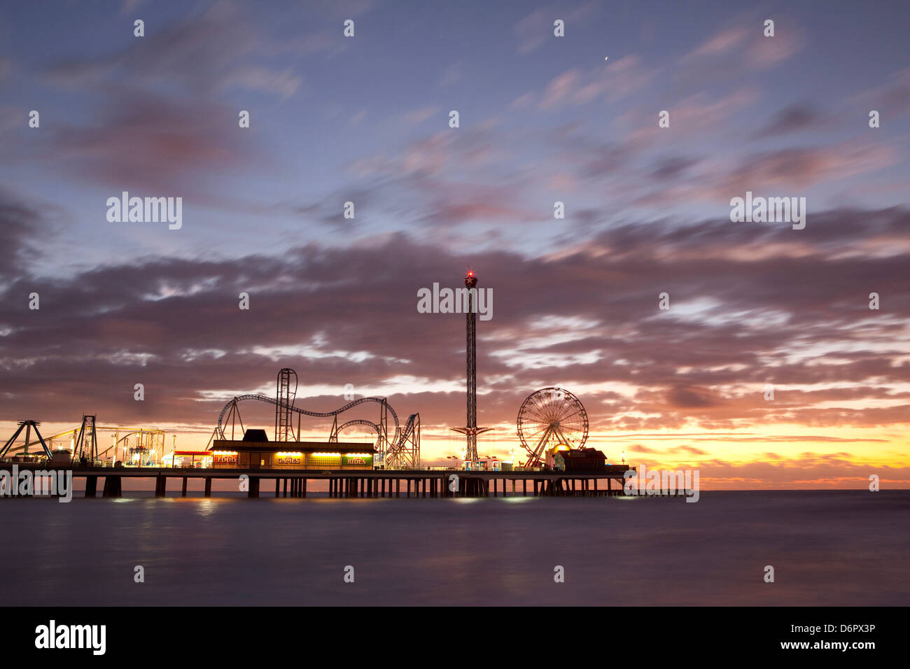USA, Texas, Galveston, Pleasure Pier Amusement Park at sunrise Stock