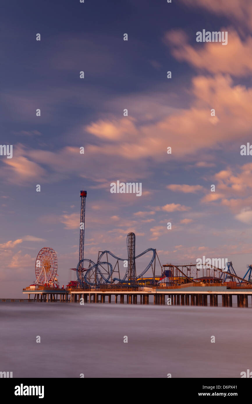 USA, Texas, Galveston, Pleasure Pier Amusement Park at sunrise Stock