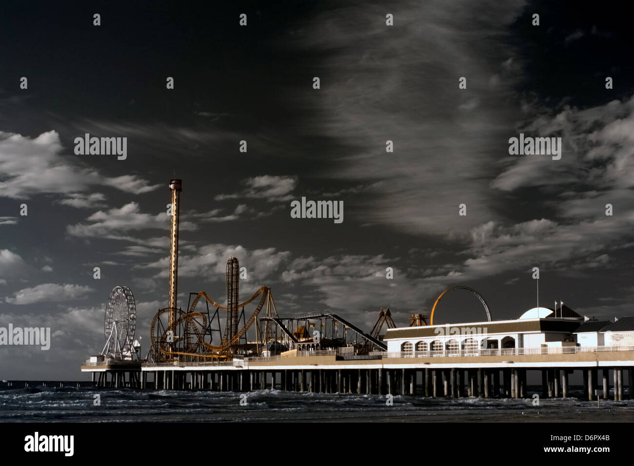 USA, Texas, Galveston, Pleasure Pier Amusement Park at sunrise Stock