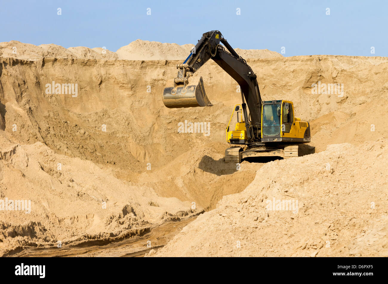 Yellow Excavator at Construction Site Stock Photo - Alamy