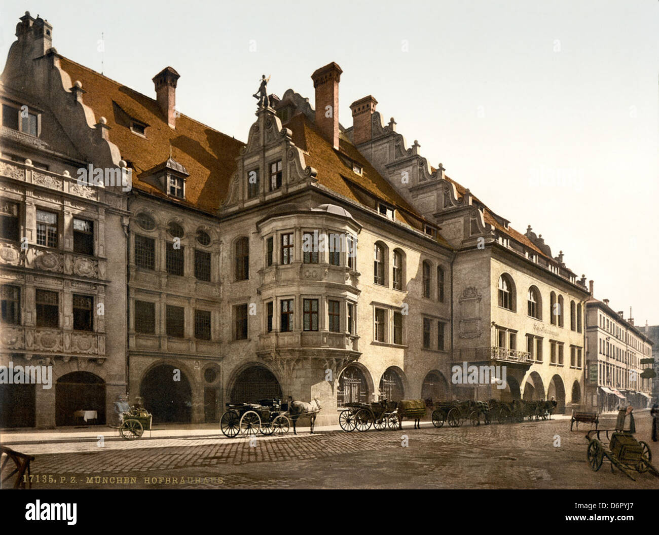 This image shows the Hofbräuhaus in Munich, Bavaria, Germany, around the year 1900. The Hofbräuhaus is a famous beer hall, known for its history and cultural significance in Munich. Stock Photo