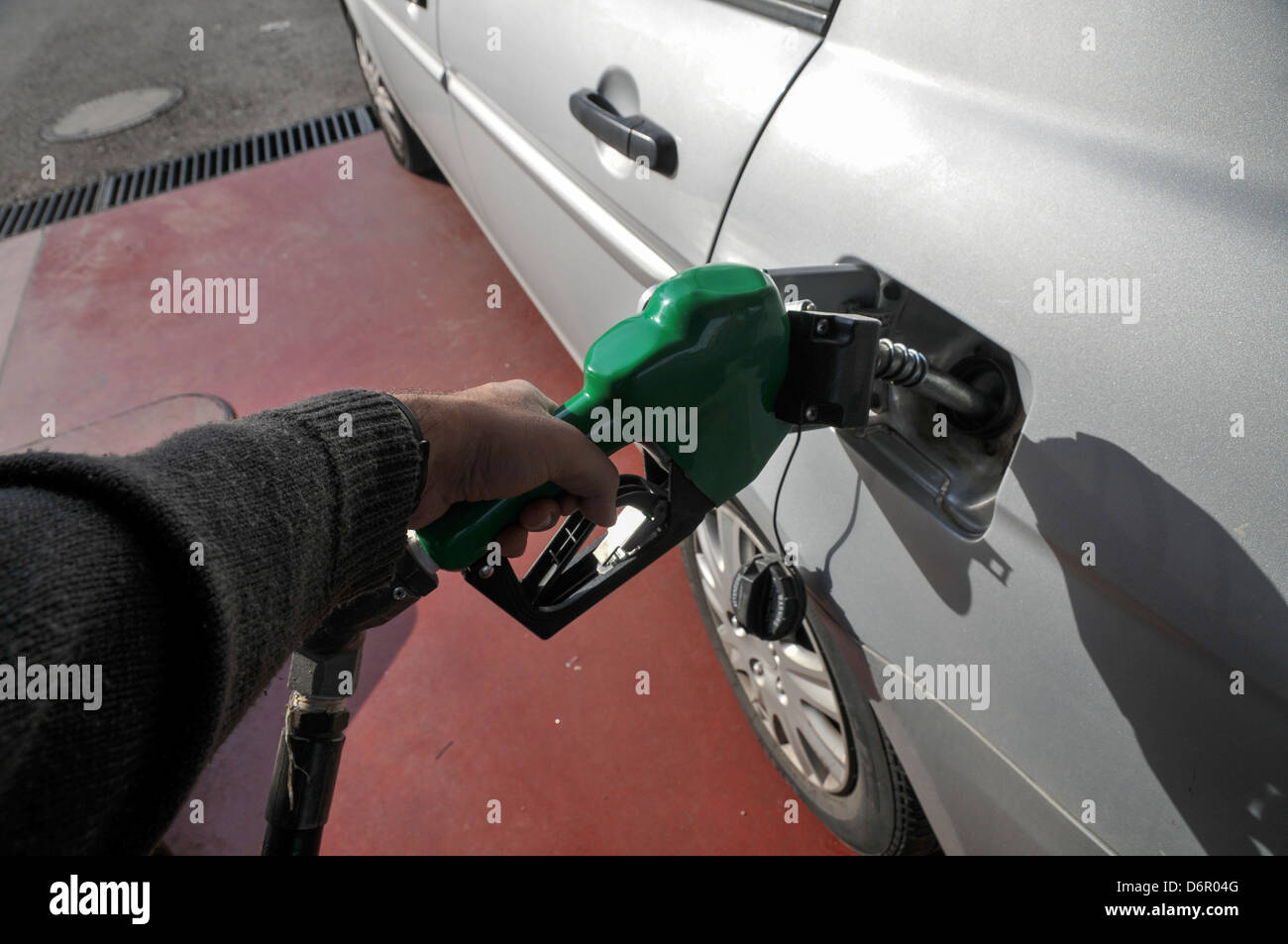 Petrol Station car is refuelled with unleaded petrol Stock Photo Alamy