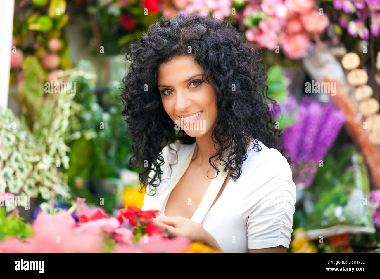 Portrait of a smiling greenhouse worker Stock Photo - Alamy