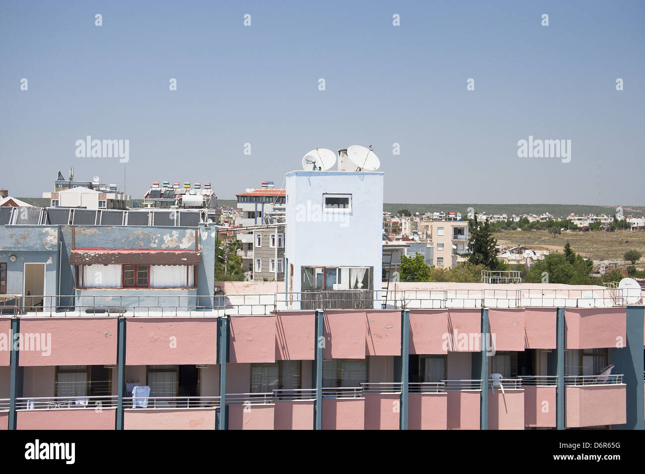 Satellite Dishes on the top of Roofs Stock Photo