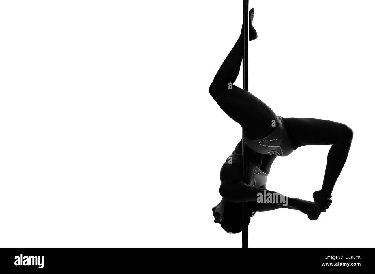 Pole dancer isolated in white Stock Photo