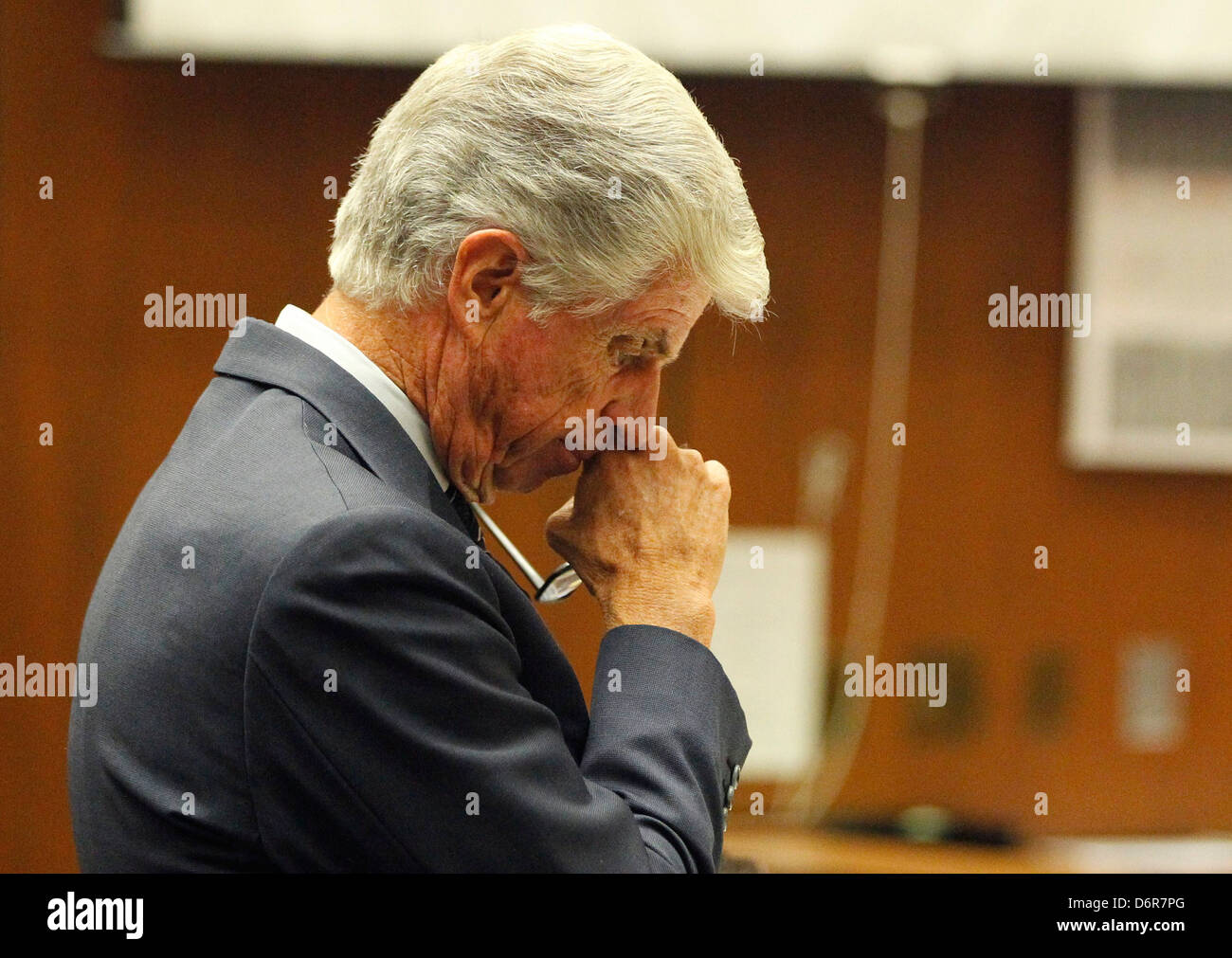 Defense attorney J. Michael Flanagan pauses as he questions Dr. Thao Nguyen during Dr. Conrad Murray's trial in the death of Stock Photo