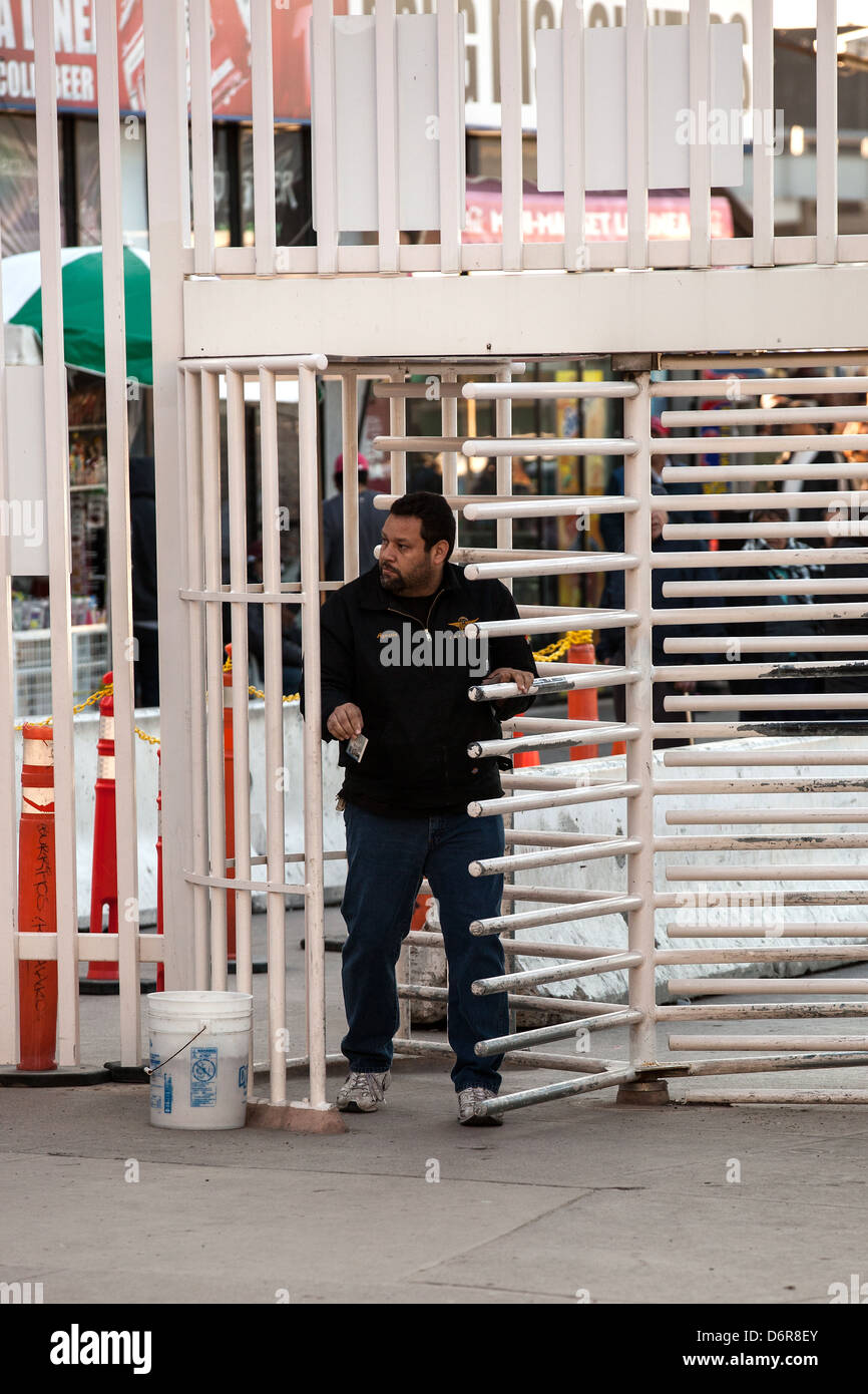 A pedestrian crosses into the USA at the San Ysidro border Crossing February 17, 2012 in San