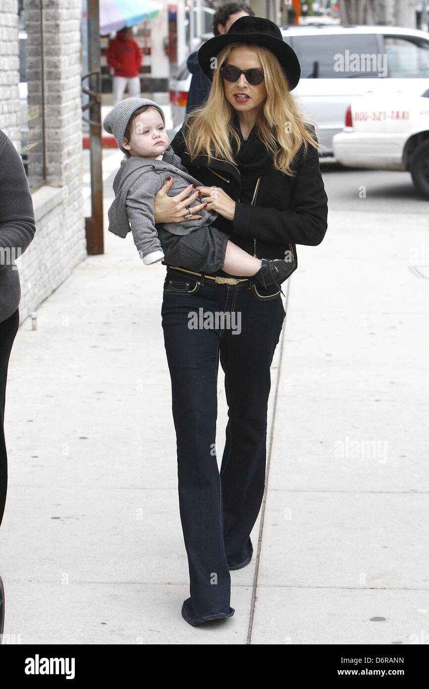 Rachel Zoe holding her son, Skylar in her arms as she goes Christmas ...