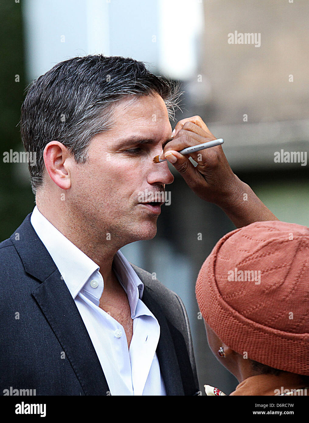 James Caviezel filming on the set of the new TV show 'Person of Interest' at Ebbets Field in Brooklyn New York City, USA - Stock Photo